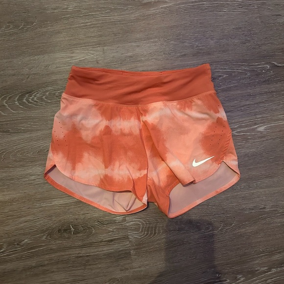 Nike Orange Athletic Shorts with Lightweight Fabric and Curved Hem - Picture 1 of 7